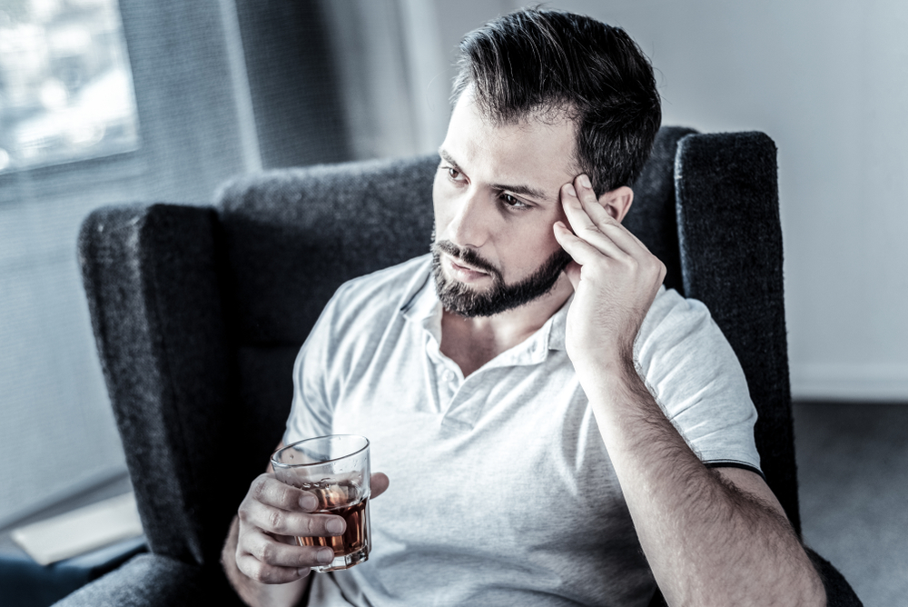 What Are 3 Symptoms Of An Alcoholic?